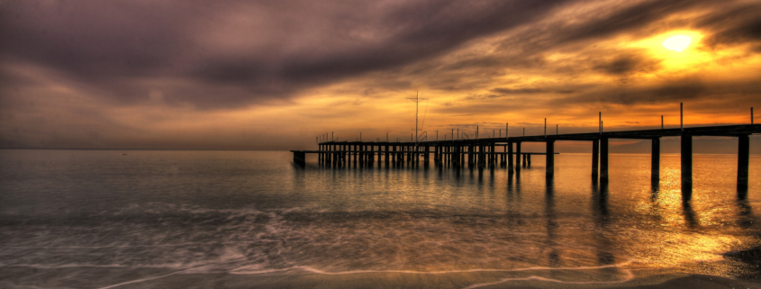 Canva – Wooden Pier at Sunset